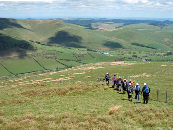 6.Cwm Maen Gwynedd in the Berwyn Mountains
The final descent. The farm from which we started our ascent can be seen above Dafydd's head.
Keywords: May10 Ian Sunday