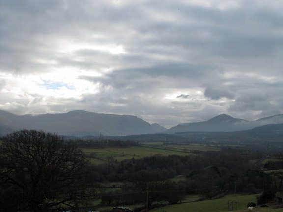 3.Bangor Circular.
23rd Jan 2011. At our 11'es coffee break with Bethesda and the Nant Ffrancon valley in the distance.
Keywords: January11 Sunday Dafydd Williams