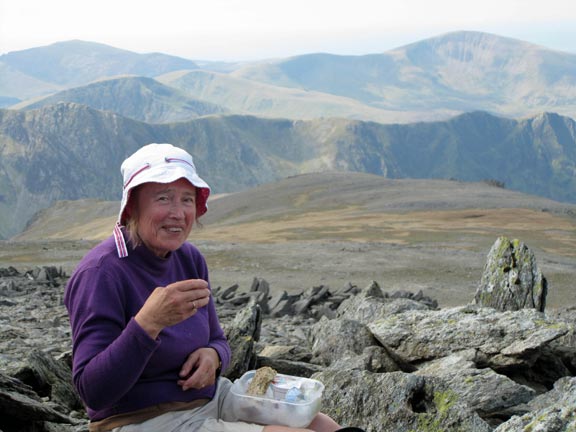 4.Glyders
17th April 2011. Ah, Pam, having a dry lunch with the very wet picnic site of two weeks ago on shoulder of Snowdon conveniently visible in the background.
Keywords: April11 Sunday Hugh Evans