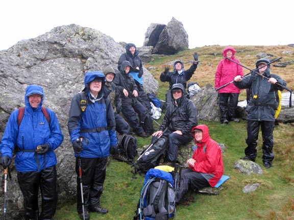 5.Shoulder of Snowdon
3rd Apr 2011. Lunch taken sheltering from the wind and rain. Spirits are high, as can just be seen. A few minutes later we made for the return path.
Keywords: April11 Sunday Pam Foster