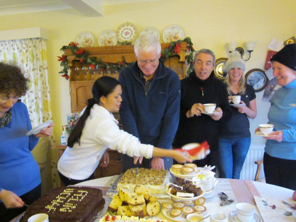 3.Abersoch, Porth Ceiriad Pwllheli
29/12/11. The reward. Tea and cakes at John & Rein's. Donations for the refeshments were in aid of the charity Felin Uchaf.Photo: Dafydd H Willams.
Keywords: Dec11 Thursday John Rein Enser
