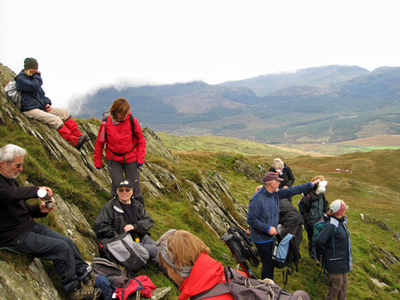 4.Yr Aran.
16th October 2011. Having done the summit we have lunch on the north side of the peak to get the view and to avoid the wind.
Keywords: Oct11 Sunday Tecwyn Noel