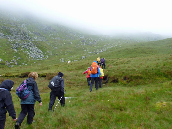 2.Across Carneddau.
24/6/12. After the first tea break close to Ffynnon Lloer we make our way up and out of Cwm Lloer and head for the Cefn Ysgolion Duon up in the clouds ahead.
Keywords: June12 Sunday Noel Davey