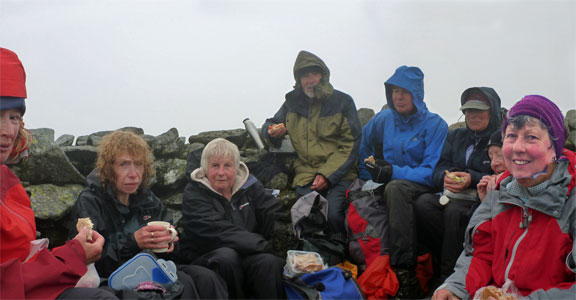 3.Across Carneddau.
24/6/12. Finally at 1:45pm we reach the summit of Carnedd Llewelyn (3490ft) and lunch. 35mph wind. Wind chill temperature 0°C.
Keywords: June12 Sunday Noel Davey