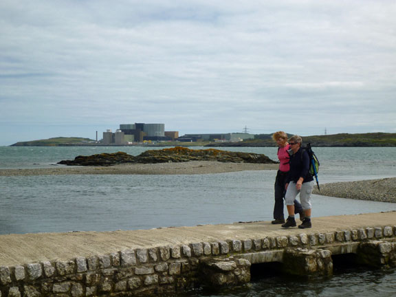 2.Anglesey Coastal Path Cemaes to Church Bay
22/07/12. Our path was diverted along the beach at Cemlyn Bay to avoid disturbing the nesting terns. Here we cross over from the beach onto Trwyn Cemlyn and then stop for lunch. Wylfa in the background.
Keywords: Jul12 Sunday Ian Spencer