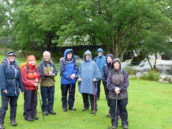 1.Cwm Bychan
2/9/12. Water water everywhere and still we smile. A quick pose before moving off in the drizzle from the Cwm Bychan car park.
Keywords: Sep12 Sunday Dafydd Williams