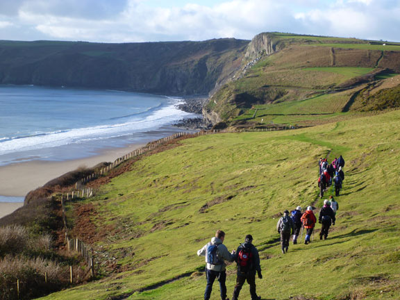 3.Walk between 2 beaches Porth Fawr and Porth Ceiriad
27/12/12. Porth Ceiriad. Surfers bobbing in the sea to our left and the sight of our lunch site, a patch of gorse, that can be seen ahead.
Keywords: Dec12 Thursday Rhian Roberts Mary Evans