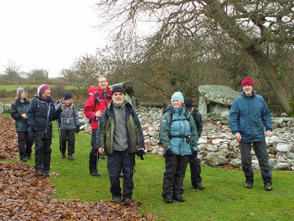 5.Dyffryn Ardudwy & Pont Scethin
9/12/12. The burial chambers close to the school on the outskirts of Dyffryn-Ardudwy. Our leader takes a great interest in old relics (Two burial chamber sites in one walk). Tecwyn keeps out of the photographer's sight. Photo: Dafydd Williams.
Keywords: Dec12 Sunday Catrin Williams