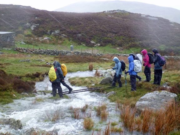 5.Arenig Fawr
11/05/14. Just the horizontal ladder to negotiate and then its lunch in the bothy on the left.
Keywords: May14 Sunday Tecwyn Williams