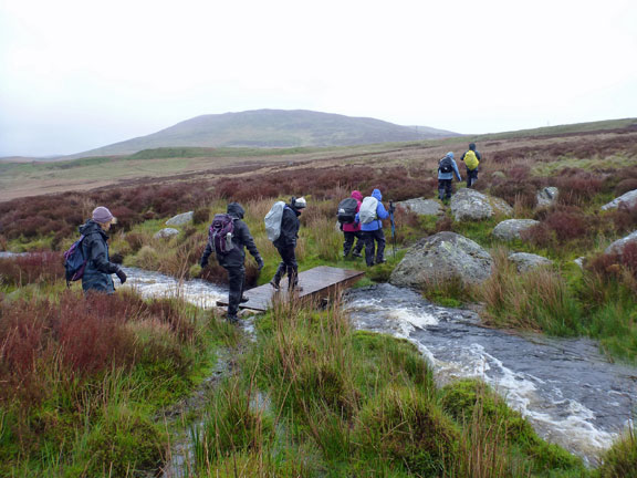 6.Arenig Fawr
11/05/14. After lunch we head out on a low level walk. In true Tecwyn tradition.... no path... but a better class of bridge. Mynydd Nodol in the background.
Keywords: May14 Sunday Tecwyn Williams