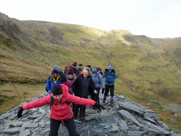 3.Croesor Circular.
2/1/14. We head back straight into a strong wind as we return from the end of the slate tip at Bwlch Cwmorthin. Lunch next at the disused quarry buildings nearby.
Keywords: Feb14 Sunday Tecwyn Williams