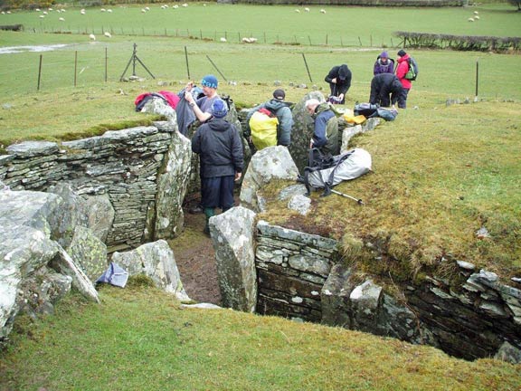 3.Betws y Coed to Capel Garmon
29/3/15. Capel Garmon Chambered Long Cairn. Lunch. The gents dig in and the ladies camp out. Photo: Dafydd Williams.
Keywords: Mar15 Sunday Dafydd Williams