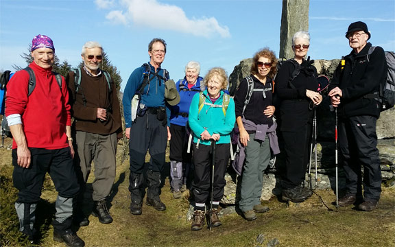 5.Llyn Crafnant & Geirionydd
15/2/15. A quick pose at the Taliesin Memorial at the north end of Llyn Geirionydd. Probably the birth place of the Taliesin  6th Century Welsh poet, or bard. We are heading back towards Capel Curig. Photo: a visitor. Camera: Roy Milnes.
Keywords: Feb15 Sunday Hugh Evans