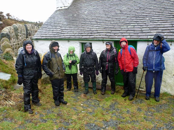 3.Porth Oer to Aberdaron
1/3/15. The very wet land windy lunch over, we are ready to move off, but not without a photograph to mark the event. We are close to the beach at Porth Felen.
Keywords: Mar15 Sunday Roy Milnes