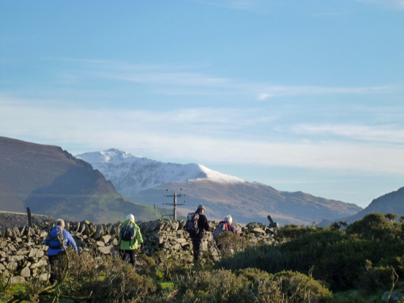 3.Talysarn – Llanberis (part of 4 valleys walk)
04/01/15. Walking around the NW side of clogwyn Melyn with a snow capped Snowdon in the background.
Keywords: Jan15 Sunday Diane Doughty