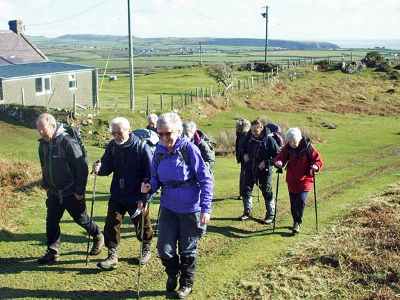 3.Mynydd Carreg Circular
18/02/16 Picking up the pace after a good lunch. Aberdaron bay can be seen in the background. Photo: Dafydd H Williams.
Keywords: Feb16 Thursday Megan Mentzoni Miriam Heald