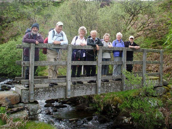 5.Cwm Hesgyn
21/5/17.  The B goup crossing a most important bridge before climbing up the steep slopes of Ffridd Bwlch-graianog. Photo: Dafydd Williams.
Keywords: May17 Sunday Hugh Evans