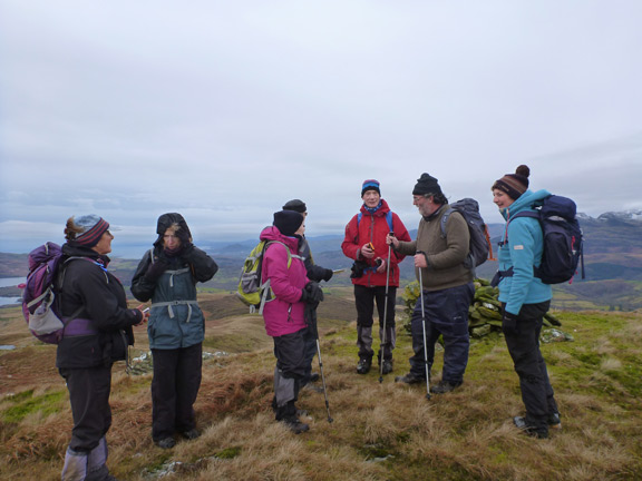 4.Foel Fawr, Graig Wen and gold mine
29/1/17. The top of Foel Fawr. The cairn can be seen behind the group.
Keywords: Jan17 Sunday Roy Milnes