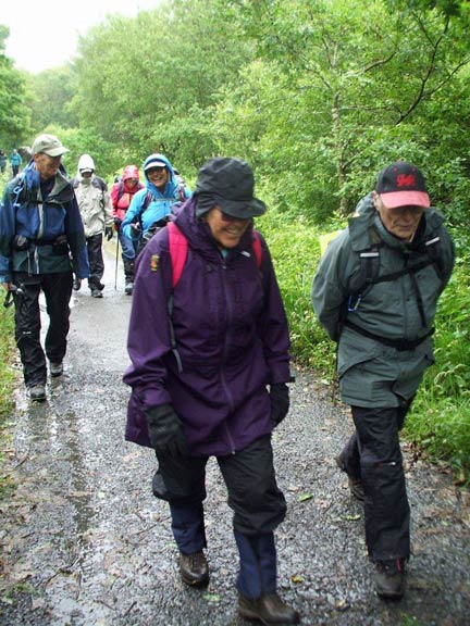 2.Ian's 80th birthday celebration walk
29/6/17. All smiles despite the rain as we make our way to Beddgelert. Photo: Dafydd Williams.
Keywords: Jun17 Thursday Ian Spencer