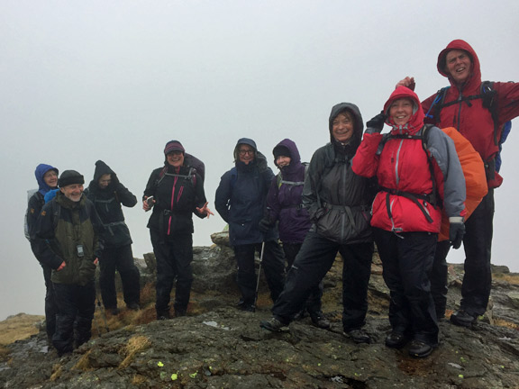 4.Moel Ddu
12/3/17. On top of the northern peak of Moel-ddu. We didn't have to do this peak but nobody was goiing to stop up even with lunch waiting for us below.  Wind chill 0 deg C. Photo: Heather Stanton.
Keywords: Mar17 Sunday Tecwyn Williams