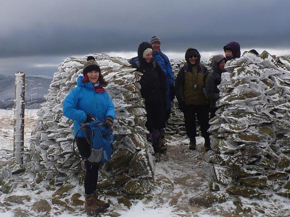 4.Moel Eilio
12/2/17. Finally at the top. The wind combined with the driven snow have beautifully decorated the cairn. However no time to stop. It was freezing in the wind.
Keywords: Feb17 Sunday Heather Stanton