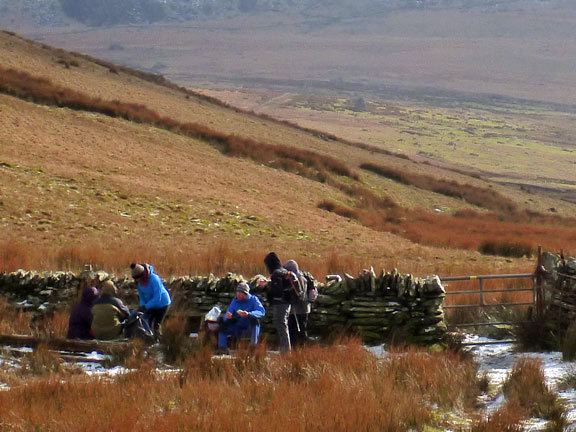 7.Moel Eilio
12/2/17. Lunch at Bwlch Maesgwm. We had struggled a bit with the steep snow covered slopes of our descent. 
Keywords: Feb17 Sunday Heather Stanton