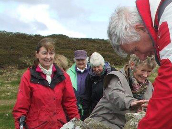 1. Mynydd Rhiw Circular
13/4/17. Much interest cause by one member's efforts at the wall, near the beginning of the walk. Photo: Dafydd Williams.
Keywords: Apr17 Thursday Marian Hopkins