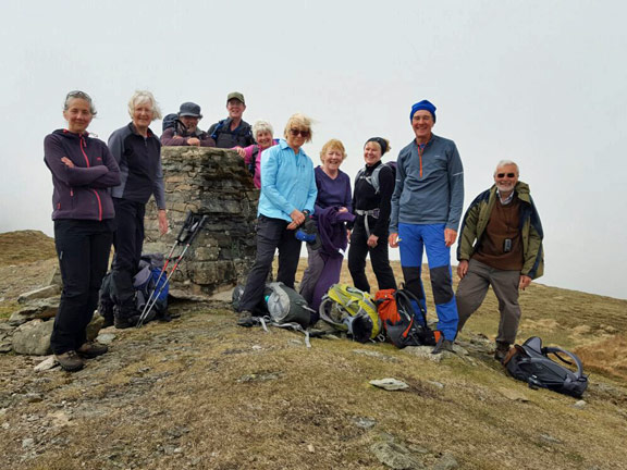 4.Rhobell Fawr
9/4/17. The summit of Rhobell Fawr. The sun has gone. the cloud has come down and we are getting the full force of the wind. We are not going to hang about. We want a sheltered place for lunch. Photo: judith Thomas.
Keywords: Apr17 Sunday Judith Thomas