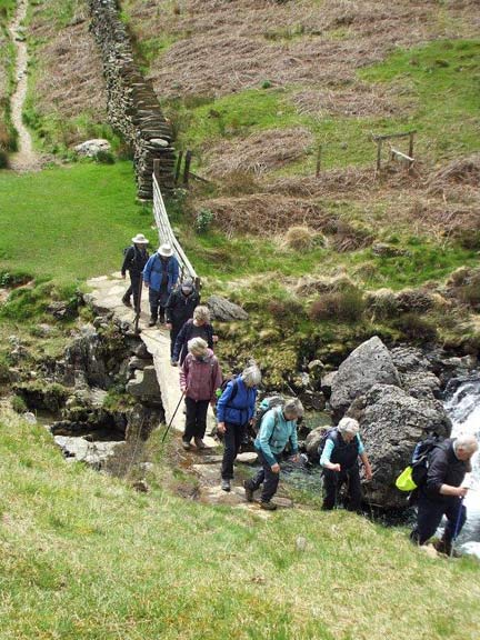 7.Bethania - Cwm Llan
10/5/18. Crossing a rather precarious stone slab  bridge over the river above Hafod y Llan. Who said the C walks were a doddle? Photo: Dafydd Williams.
Keywords: May18 Thursday Dafydd Williams