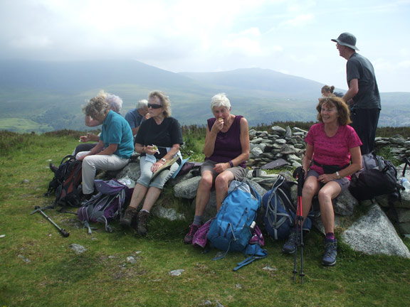 6.Y Fron
3/6/18. Afternoon tea break on top of Mynydd Cilgwyn. The Nantlle Ridge in the background. Photo: Dafydd Williams.
Keywords: Jun18 Sunday Kath Mair