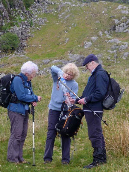 6.Cnicht via Llynnau Myllt & Llynnau Cwn (A walk) & Around Yr Arddu (B walk) 
19/5/19. Near Carnedd Melyn with just half an hour of walking left, water supplies are shared (A walk).
Keywords: May19 Sunday Richard Hirst Dafydd Williams