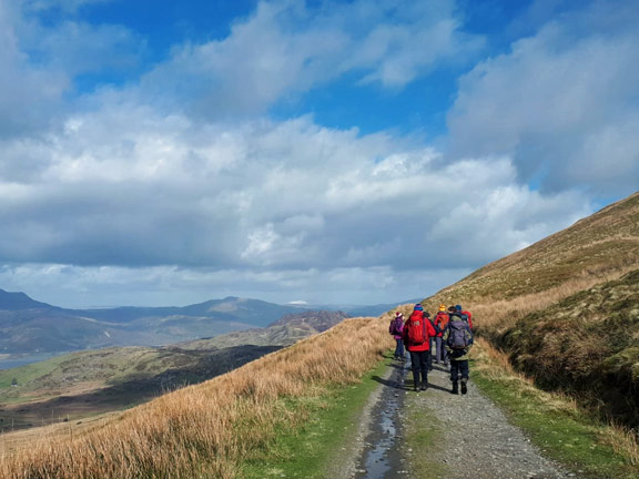 4.Llwyngwril 'A' Walk
10/3/19. Continuing along Ffordd Ddu with the snow capped peak of Arennig Fawr in the distance. Photo: Judith Thomas. 
Keywords: Mar19 Sunday Hugh Evans