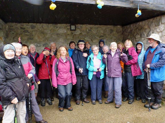 10. Malhamdale 2019
3rd-10th May 2019. The end of a very wet and windy day. All two groups met up at Kettlewell at the end of their walks. This photograph was taken in a bus shelter after the refreshments. Photo: Hugh Evans.
Keywords: May19 Hugh Evans