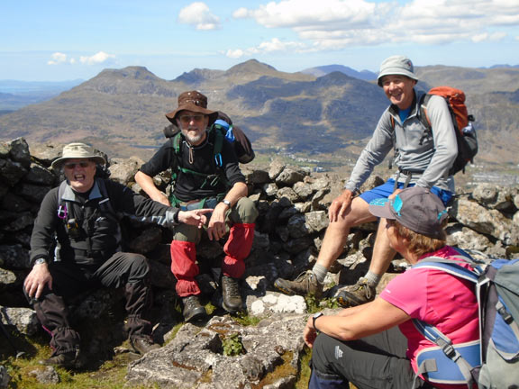 2.Manod Mawr
12/5/19. On the summit of Manod Mawr. A few are lucky enough to get a sheltered seat. Photo: Dafydd Williams.
Keywords: May19 Sunday Tecwyn Williams