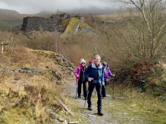 8.Talysarn-Fron-Nantlle.
17/3/22. Bring up the rear near the end of the walk. One of the old quarry structures in the background. Photo: Louise Baldwin.
Keywords: Mar22 Thursday Meri Evans