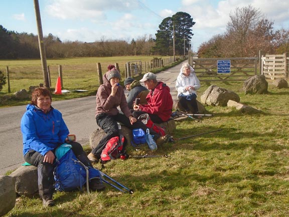 6.Cylchdaith Ynys Circular
17/2/22. Lunch at a very convenient spot on the approach road to the council recycling centre. There was a seat for each of us. Photo: Dafydd Williams.
Keywords: Feb22 Thursday Tecwyn Williams