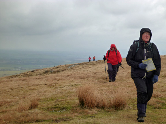 18.Dartmoor April 2013.
21/04/13. The Medium walk group passes the Hard Walk group as they rest.
Keywords: Apr13 week Ian Spencer