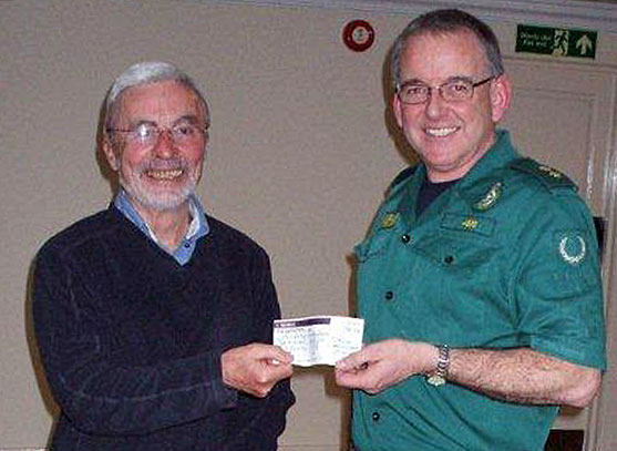 15.Winter Dinner.
7/2/13. John Dobson Jones team leader of the local Ambulance Service and founder member of the Aberglaslyn Mountain Rescue Team, having first given his talk, was presented with a cheque for £185 to support mountain rescue efforts,  Photo: Dafydd Williams.
Keywords: Feb13 Thursday Dafydd Williams