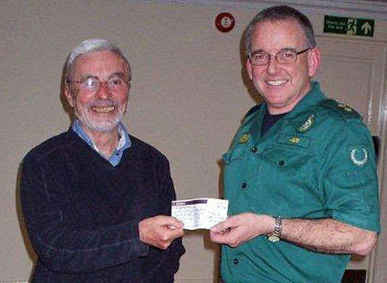 15.Winter Dinner.
7/2/13. John Dobson Jones team leader of the local Ambulance Service and founder member of the Aberglaslyn Mountain Rescue Team, having first given his talk, was presented with a cheque for £185 to support mountain rescue efforts,  Photo: Dafydd Williams.
Keywords: Feb13 Thursday Dafydd Williams