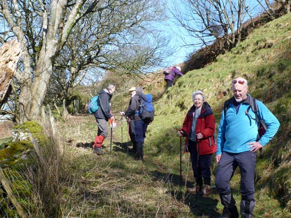 2.Tonfanau
17/03/13. Morning refreshment break near Bronclydwr. In the background one of our number is aiming for the sêt fawr.
Keywords: Mar13 Sunday Judith Thomas