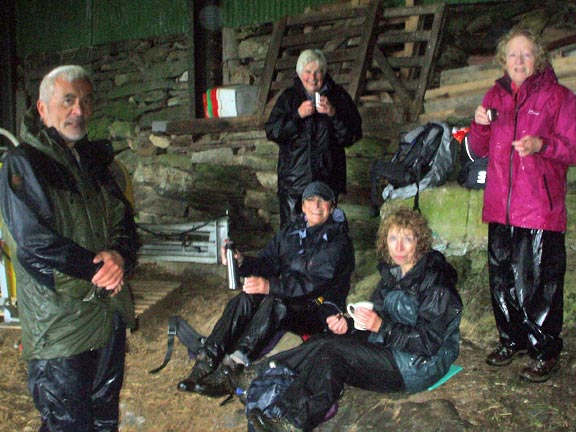 1.Dolwyddelan
15/9/13. A tea break in the only shelter available towards the end of a very wet walk. Photo: Dafydd Williams.
Keywords: Sept13 Sunday Dafydd Williams
