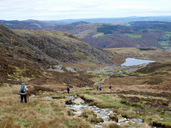 4.Foothills of Moel Siabod
24/11/13. Lunch over we decend past an un-named lake. Mountains of the Carneddau group in the distance to the left.
Keywords: Nov13 Sunday Judith Thomas