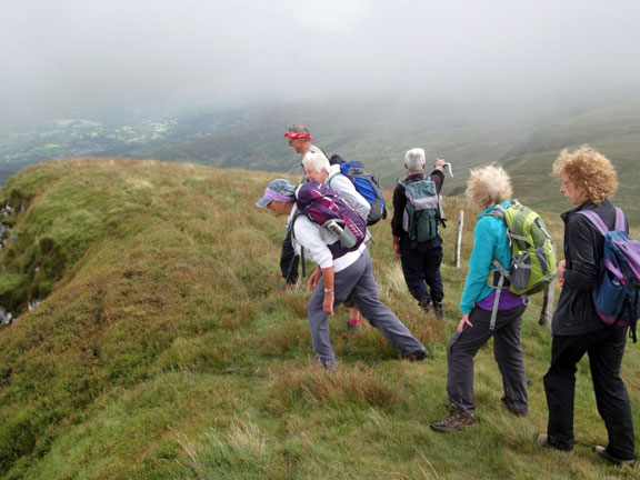 2.Craig y Llyn a Braich Ddu A walk.
18/08/13. View from close to the top of Tyrrau Mawr. The A group being very circumspect. It's a long way down. Photo: Roy Milner.
Keywords: Aug13 Sunday Noel Davey