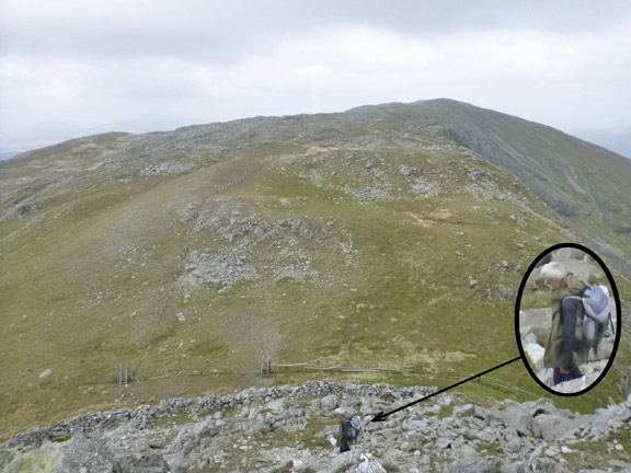 4.Aran Benllyn, Aran Fawddwy
14/9/14. Decending from Aran Fawddwy. In the distance on the right, the ridge (Erw y Ddafad Ddu) we are going to take, down to the head of Cwm Llwydd. It is interesting to see how many walkers have not noticed that the fence on the left hand side of the right hand style has gone.
Keywords: Sept14 Sunday Hugh Evans