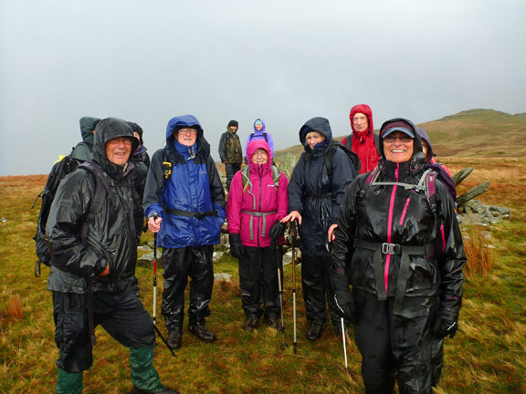 3. Harlech to Llandecwyn - Ardudwy Way
9/11/14. Smiling despite the rain. Behind our intrepid explorers is Bryn Cader Faner, a Bronze Age round cairn.
Keywords: Nov14 Sunday Dafydd Williams