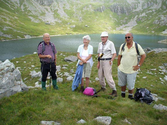 1.Foothills of Cadair Idris
20/7/14. The C walkers posing with Llyn Gadair in the background, at just about the same time as the A group is  walking along the ridge above. Photo: Dafydd Williams & Nick White,
Keywords: Jul14 Sunday Nick White