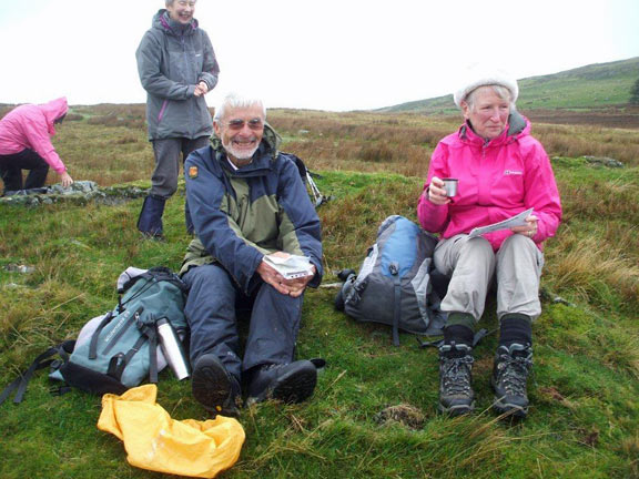 3.Circumnavigating base of Moelfre
30/10/14. Our chairman manages a smile despite the weather. Photo: Dafydd Williams.
Keywords: Oct14 Thursday Cath Marsden