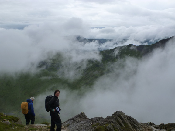 4.Gallt y Wenallt - Y Lliwedd
5/7/15. The cloud clears a bit as we leave Y Lliwedd, but Snowdon (to the right) is still in cloud.
Keywords: Jul15 Sunday Noel Davey