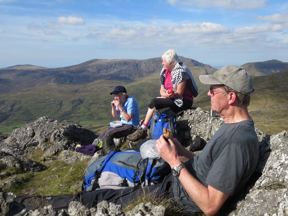 3.Beddgelert Three Peaks
27/9/15. while others at lunch, contemplate "Life, the Universe, and Everything" The Nantlle Ridge in the background. Photo: Roy Milnes.
Keywords: Sep15 Sunday Hugh Evans