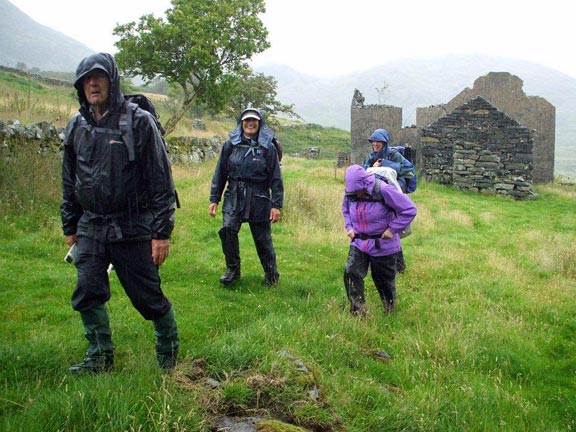 3.Tremadog – Cwm Ystradllyn circ
2/8/15. The forecast was wrong but its nearly lunch time. The shores of Llyn Cwmystradllyn down out of sight on the left. Photo: Dafydd Williams 
Keywords: Aug15 Sunday Ian Spencer